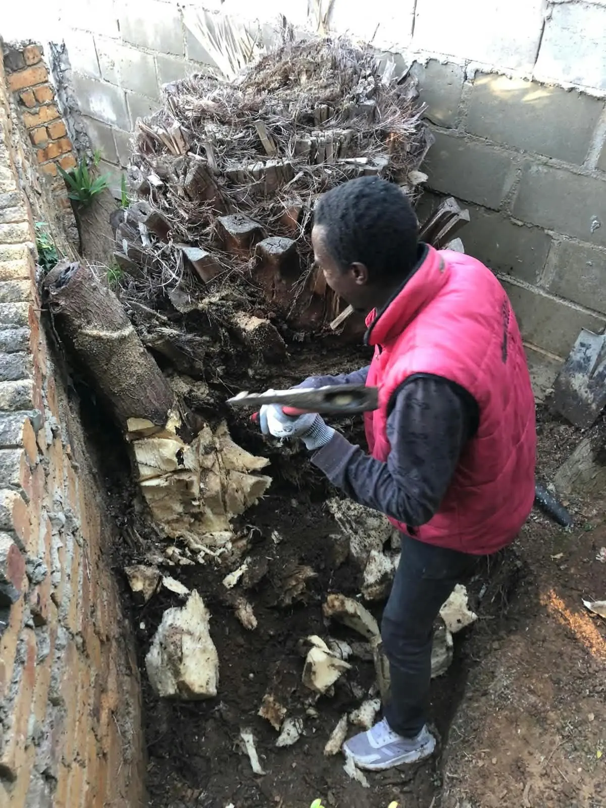 Breaking out an old concrete foundation on a WBS RenCon site