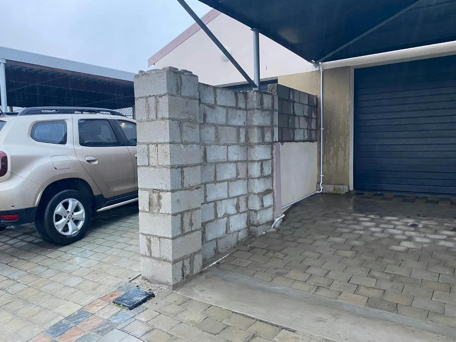 New block wall built alongside a driveway